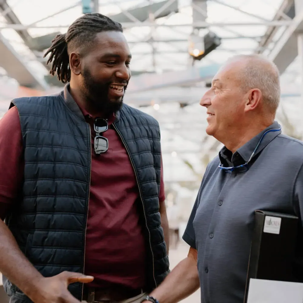 Two professionals in conversation